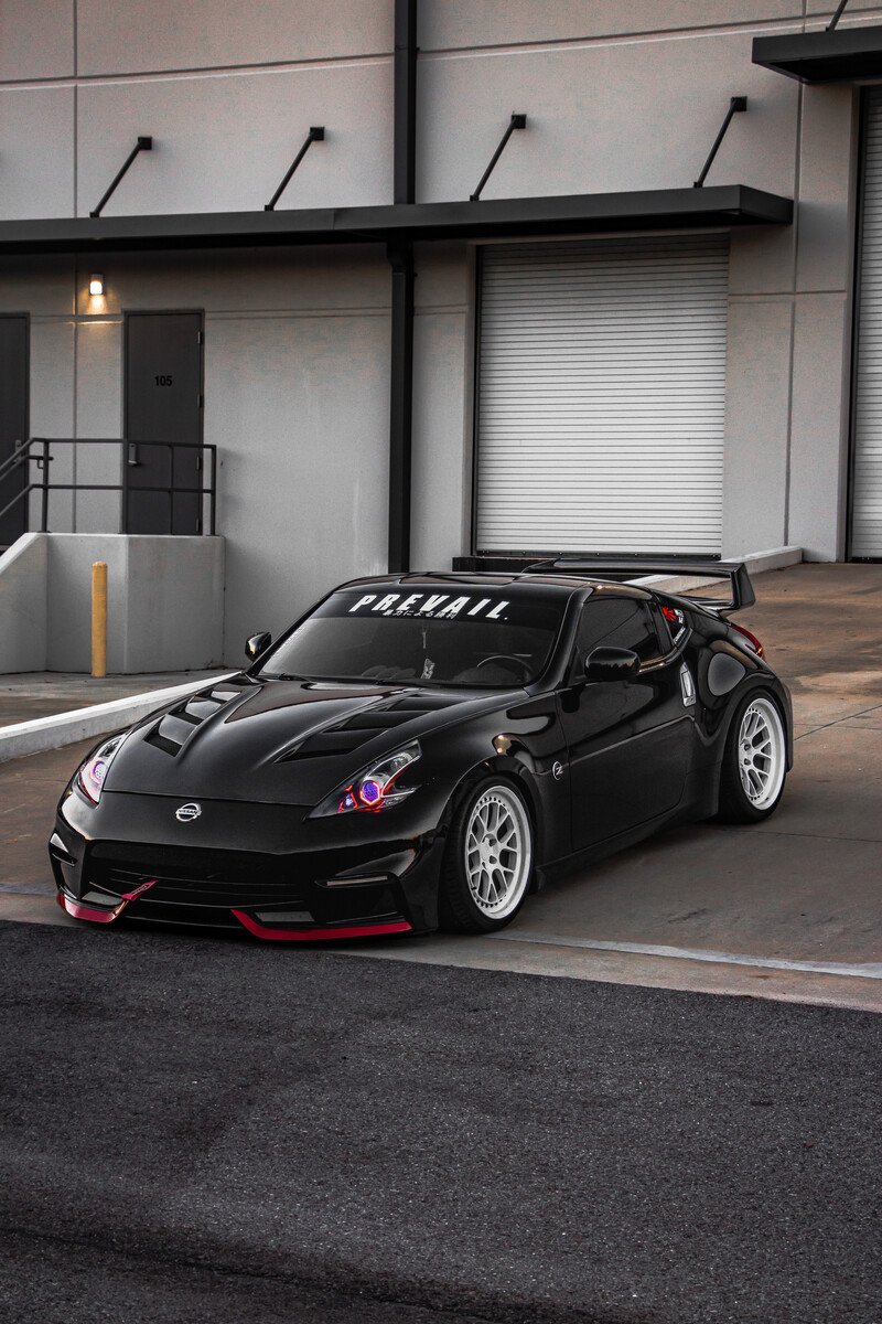 Aggressive aero kit with front splitter and rear diffuser for track performance